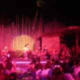 The whole luau crew on stage.