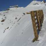 The ski went from the little hill in the top right, across the ski slope, and down the big hole to the left. (You can see the track it made.)