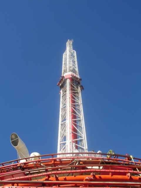 The Big Shot is some kind of pneumatic-turbolift-ish device with a central shaft and a sled with sixteen chairs mounted around it. You sit on the chairs, strapped in with harness and all, and then you're launched along the shaft up, about a hundred feet. The Big Shot is some kind of pneumatic-turbolift-ish device with a central shaft and a sled with sixteen chairs mounted around it. You sit on the chairs, strapped in with harness and all, and then you're launched along the shaft up, about a hundred feet.