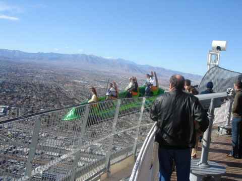 The X-Scream is a sled on a rail that is tipped down over the edge of the tower. To the great disappointment of all Muslim extremists out there, the screaming Americans do not plunge to their death - the sled stops with the first pair of riders sitting just in front of the outermost end of the rail. The X-Scream is a sled on a rail that is tipped down over the edge of the tower. To the great disappointment of all Muslim extremists out there, the screaming Americans do not plunge to their death - the sled stops with the first pair of riders sitting just in front of the outermost end of the rail.
