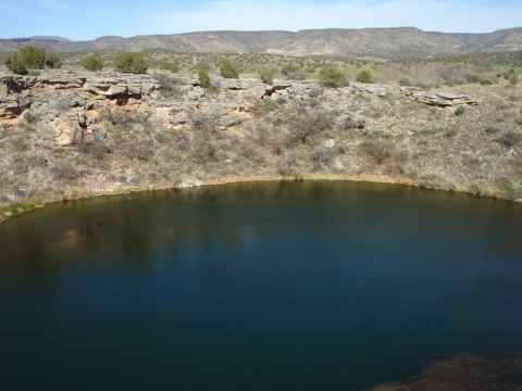 The well. It is a collapsed sinkhole formed when underground waterflows eroded the overlying strata, forming a cavity. When the cavity grew big enough to not be able to support the top, it fell down, leaving a water-filled hole in the middle of the desert. The well. It is a collapsed sinkhole formed when underground waterflows eroded the overlying strata, forming a cavity. When the cavity grew big enough to not be able to support the top, it fell down, leaving a water-filled hole in the middle of the desert.