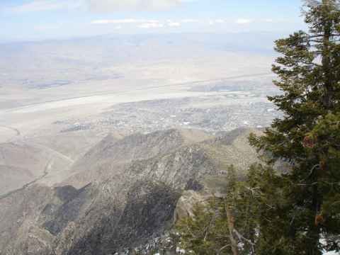 View from the top. Palm Springs can be seen spread out on the desert valley floor. View from the top. Palm Springs can be seen spread out on the desert valley floor.