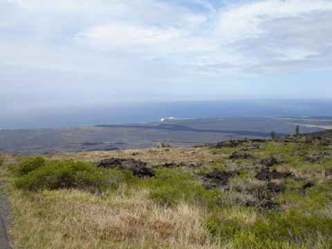 A lava flow going down to the sea. A lava flow going down to the sea.