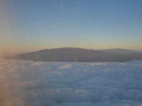 View of Mauna Kea as the plane departs for Maui. View of Mauna Kea as the plane departs for Maui.