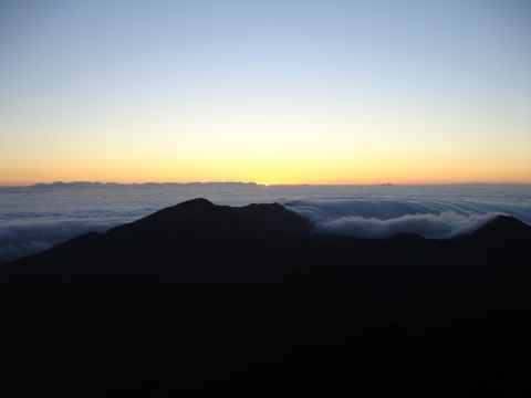 Then, suddenly, a point of light appears at the horizon.