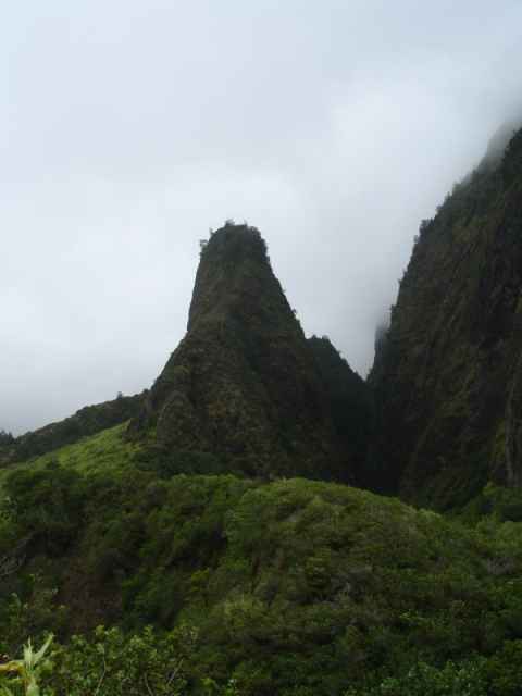 The "Iao Needle". A piece of denser rock that was embedded in more easily erodable rock, and that remained when the surrounding rock was washed away by rains.