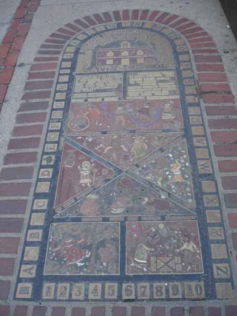 A hopscotch outside the old city hall. The building also served as the first public school.