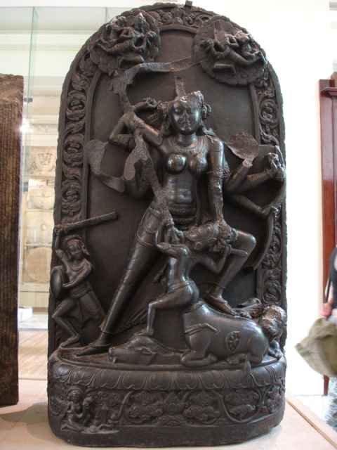 A relief depicting Durga's battle with Mahishasura. Durga is essentially the wife of Shiva transformed by the gods into a goddess of destruction in order to have someone who could defeat Mahishasura. With a body forged by the most powerful gods, weapons ranging from Shiva's trident to Vishnu's discus and just a little feeling of being totally über, she made short work of the demon. A relief depicting Durga's battle with Mahishasura. Durga is essentially the wife of Shiva transformed by the gods into a goddess of destruction in order to have someone who could defeat Mahishasura. With a body forged by the most powerful gods, weapons ranging from Shiva's trident to Vishnu's discus and just a little feeling of being totally über, she made short work of the demon.