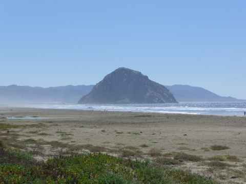 About two hundred miles from Los Angeles is Morro Bay, where this huge granite block marks the entry to the bay. About two hundred miles from Los Angeles is Morro Bay, where this huge granite block marks the entry to the bay.
