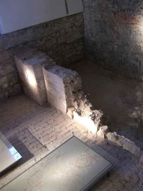 This is an ancient Romanesque (looks Roman, but they didn't build it) chapel. On the floor you can see pieces of fresco and decorations that were found in the archaeological dig. This is an ancient Romanesque (looks Roman, but they didn't build it) chapel. On the floor you can see pieces of fresco and decorations that were found in the archaeological dig.