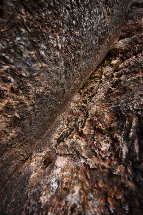 Close-up of the edge between two blocks of stone used to build Sacsayhuamán. Besides a little bit of sand, the fit is perfect.