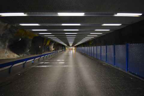 Looking in through the entrance to the subway station. The site of the next photo can be seen in the distance.