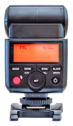 Back of the flash with the LCD display illuminated.