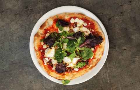 Pizza with chevre cheese, honey and walnuts.