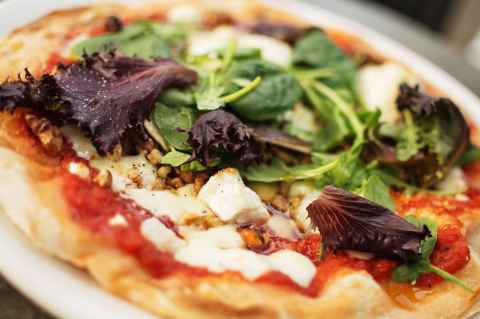 Pizza with chevre cheese, honey and walnuts.